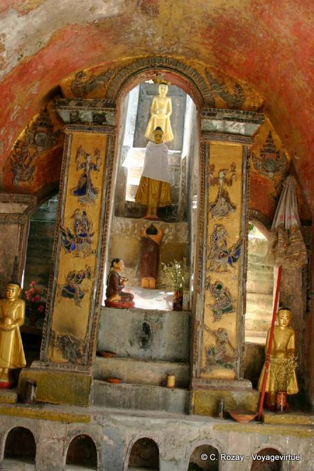 Nats and Buddhas on a staircase, Shwe Yan Pyay monastery, Inle Lake - Myanmar (Burma)