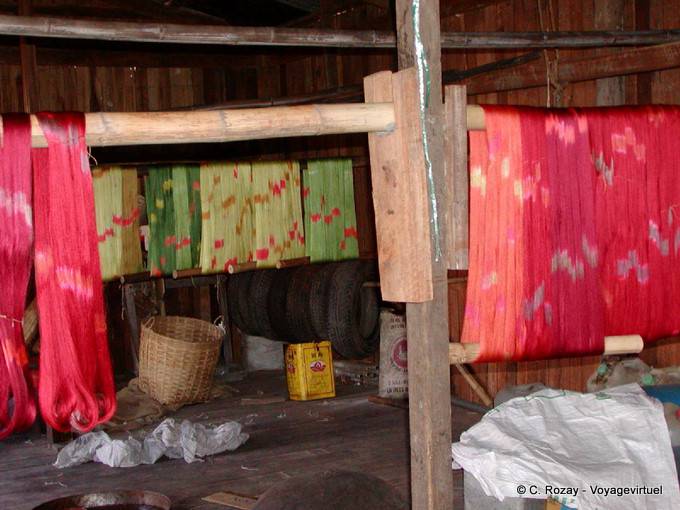 Drying the colored silk manually Inle Lake - Myanmar (Burma)