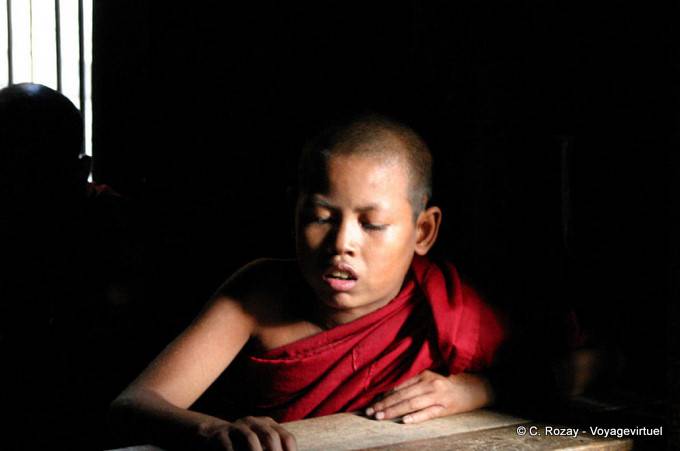 Little monk in the monastery learning, Bagaya Kyaung, Inwa, Mandalay - Myanmar (Burma)