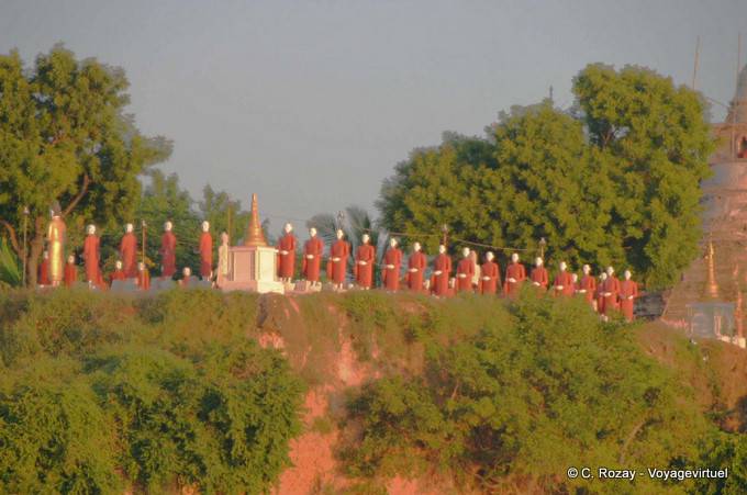 Statues lined up on a promontory, Sagaing - Myanmar (Burma)