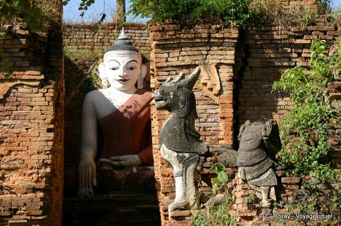 Buddha in a well-kept brick pagoda, archaeological site of Sankar - Myanmar (Burma)