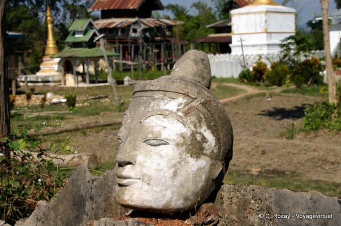 Severed head isolated stone on the site of Sankar - Myanmar (Burma)