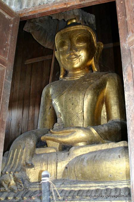 Golden Buddha seated, jumping cats monastery, Nga Phe Chaung, Inle Lake - Myanmar (Burma)