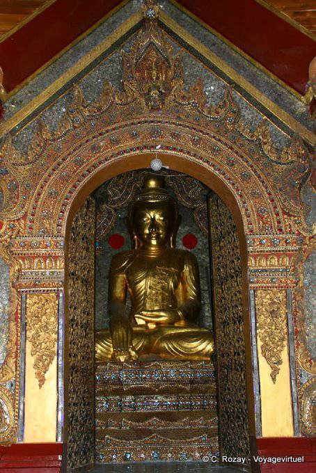 Buddha in a richly decorated niche, Hpaung Daw U Pagoda, Inle - Myanmar (Burma)