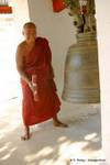 The monk at the bell, Bagan, Burma.