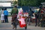 Transport of a nun offerings, Nyaung-U, Bagan, Burma.