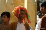 Wearing a multi-colored towel, Bagan, Burma.