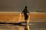 Intha fisherman with a net, Inle Lake, Burma.
