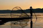 Inle Lake, the conical trap on the boat Fisherman Intha, Burma.