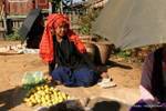 Pa-O woman selling apples at the market, Inle Lake, Burma.