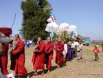 Procession of monks in red, Taung To, Inle Lake, Burma.