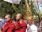 Doorure on palanquin and shaved monks procession Taung To Inle Lake, Burma.