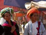Burmese wearing headdresses Pao market, Inle Lake, Burma.