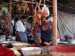Poultry and sausages hanging from the market, Inle Lake, Burma.