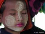 Face painted in thanaka bè gya, Inle Lake, Burma.