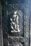 Shwe In Bin, sculpture detail on a wooden door, Mandalay, Burma.