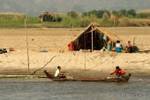 Makeshift house at the edge of Ayerwayadi, Mandalay, Burma.
