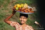 Fruit vendor during a stopover, Mandalay, Burma.