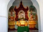 Triptych of Buddhas on an altar-U-Ponnya Sun-Shin, Mandalay, Burma.