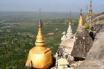 Golden Rock and country views at the foot of Taung Kalat, Mount Popa, Burma.