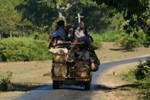 Taxi overloaded on the road to Pindaya, Burma.