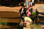 Morning dress at the water, Pindaya, Burma.
