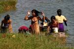 Burmese women bathing, Pindaya, Burma.
