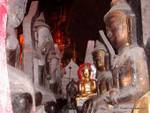 Double row of Buddhas face-to-face Schwe Umin Cave (Golden Cave), Pindaya, Burma.