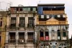 Mix of genres for the facade of an apartment building, Yangon, Burma.