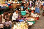 Chicken and fish stalls at street market, Yangon, Burma.