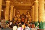Prayer in tazaung, Shwedagon Pagoda, Rangoon, Burma.