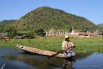 Navigation with traditional boat on Belu Chaung (stream Ogre), Sagar, Burma.