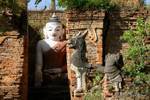 Buddha in a well-kept brick pagoda, archaeological site of Sankar, Burma.