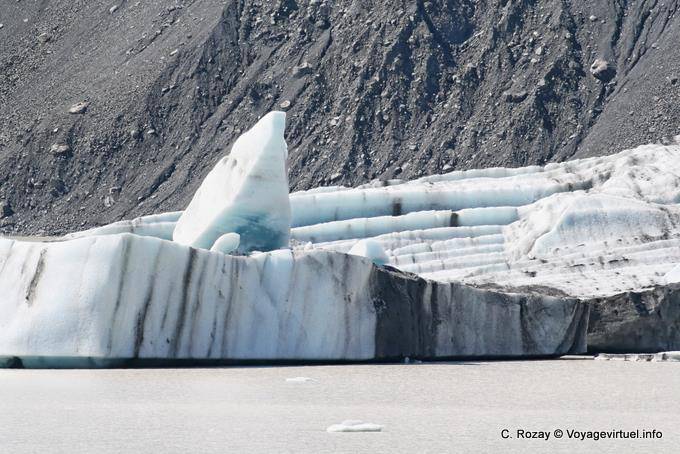 Ice chunk breaks off Tasman Glacier Tasman Lake, Canterbury - New Zealand