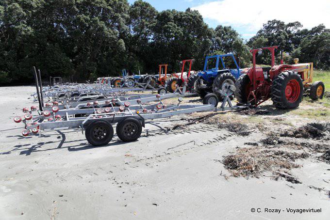 Collection tractor on the beach, Omaio, East Cape - New Zealand