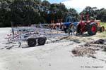 Collection tractor on the beach, Omaio, East Cape, New Zealand.