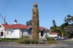 Carved Maori totem, Opotiki Carving Town Centre, East Cape, New Zealand.