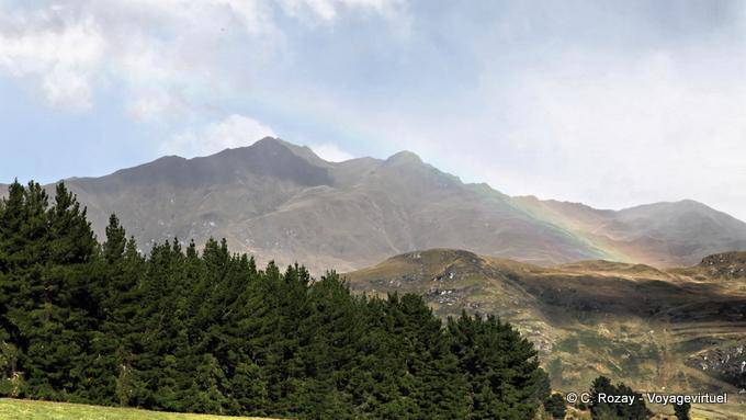 Rainbow sky over the mountains, Lake Wanaka, Southland - New Zealand