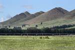 Gentle hills, Lowther Road From Te Anau to Lumsden, Southland, New Zealand.