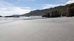 White sand and black rock, Paparoa Between Woodpecker And Hatters Bay, Westcoast, New Zealand.