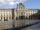 Basin in the Cour Napoléon and facade Lescot, the Louvre, Paris, France.