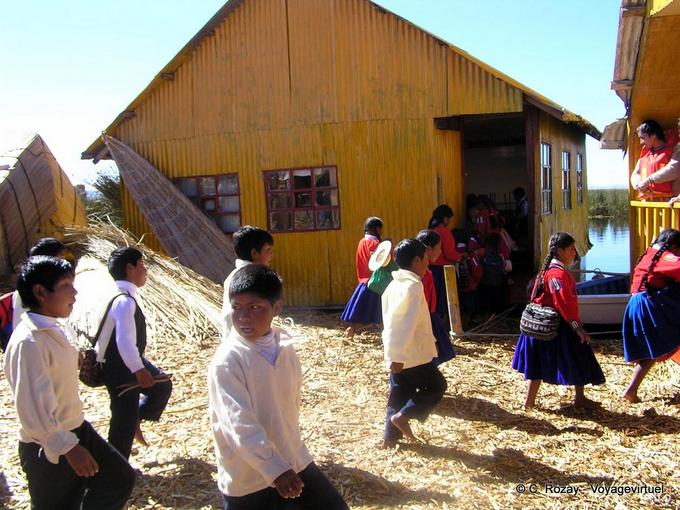 Aymara Indian youth returning to school, Lake Titicaca -Peru