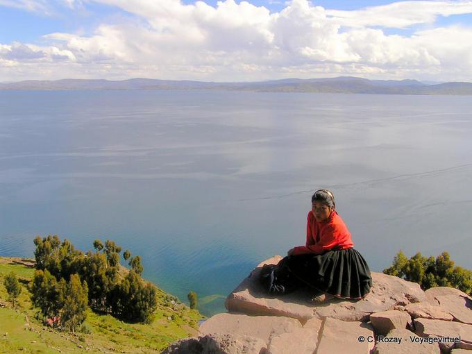Women meditation to 4050 meters altitude, Taquile Island, Titicaca -Peru