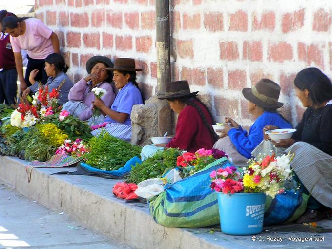 Small market sidewalk and typical hats, Ayacucho -Peru