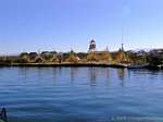 Traditional village on Uros Floating Island, Lake Titicaca, Peru.