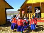 Mats in rows in front of the school, Titicaca lake, Peru.