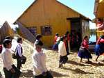 Aymara Indian youth returning to school, Lake Titicaca, Peru.