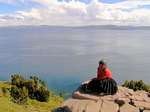Women meditation to 4050 meters altitude, Taquile Island, Titicaca, Peru.