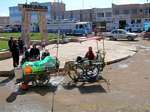 Street vendors in front of the Paseo los Kollas, Juliaca, Peru.