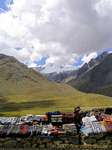 Snowy mountain range and local products, La Raya, Peru.